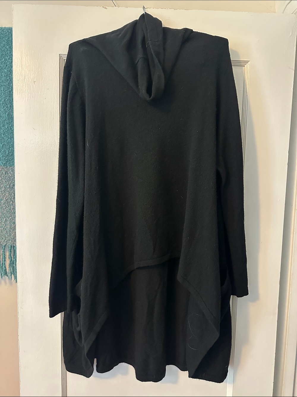 Black Ruti M/L cowl neck high low sweater with pockets.